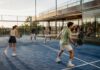 Social Padel Rally on a Glass Court