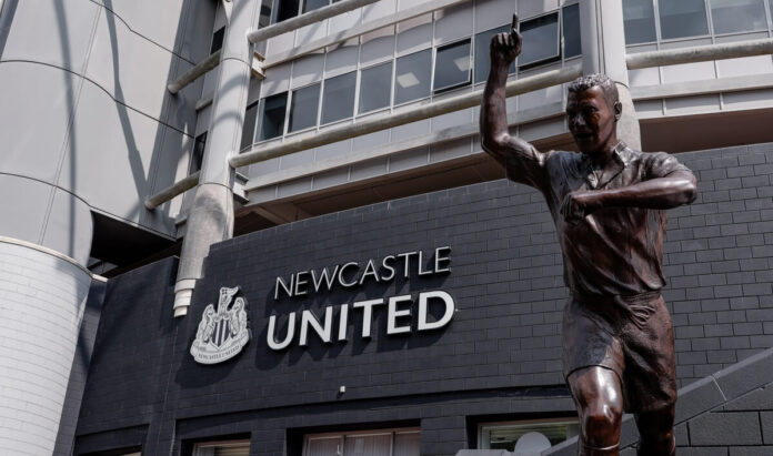 Alan Shearer statue outside St James’ Park Bronze statue of Alan Shearer with one arm raised outside St James’ Park, Newcastle